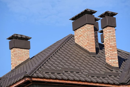 Chimney Caps 101: How a Simple Upgrade Protects Your Home From Water & Wildlife